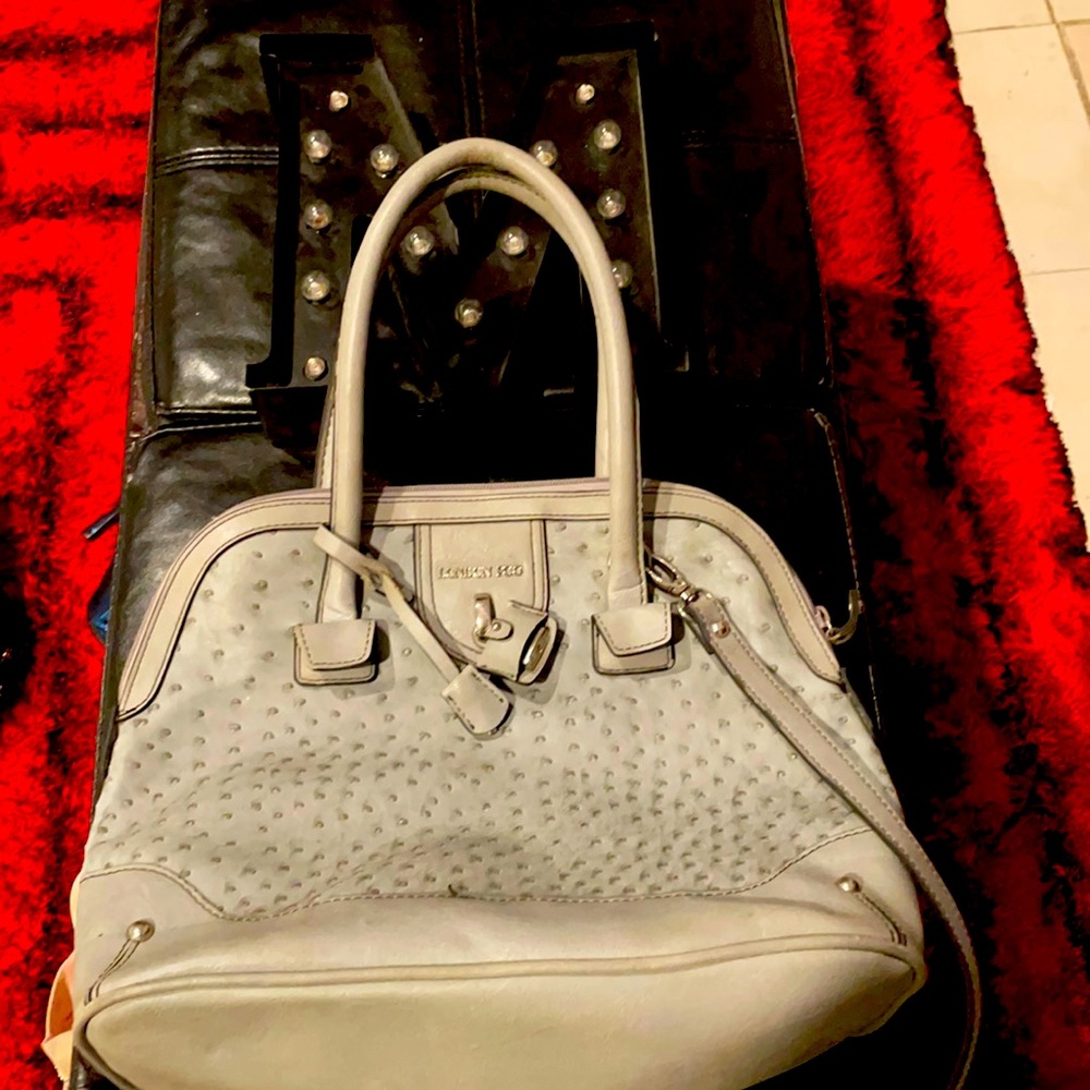 Grey ostrich leather London Fog purse with shoulder strap.